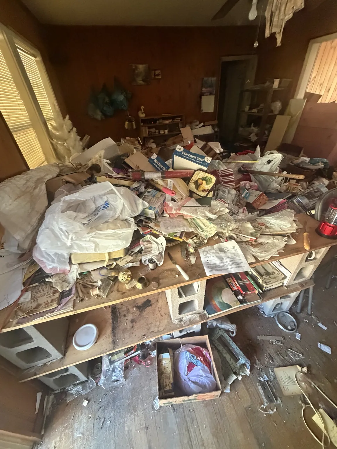 Furniture, boxes and household items piled inside the Frisco property