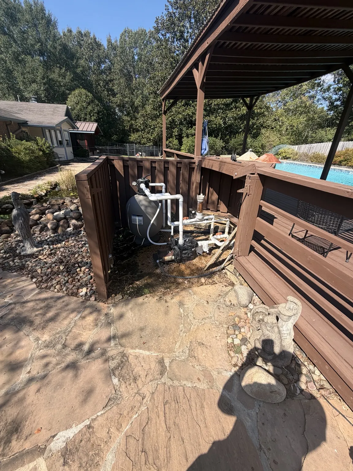 Miscellaneous bulky items and metal pieces beside an outdoor area in Frisco
