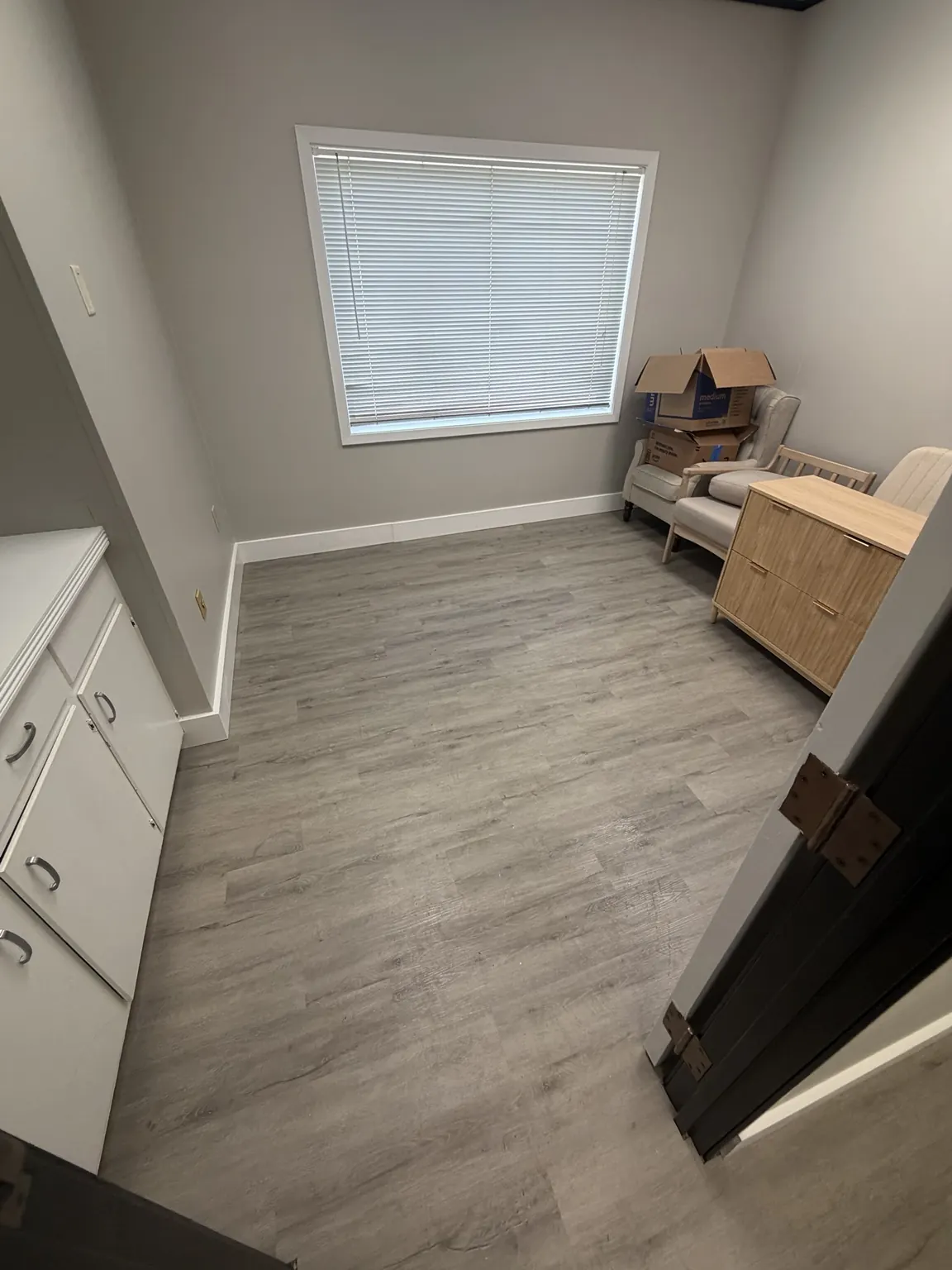 Office floor cleared of the staged bags and boxes in Frisco
